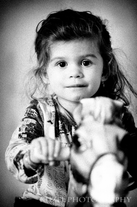 little girl on a rocking horse - petite fille sur un cheval à bascule